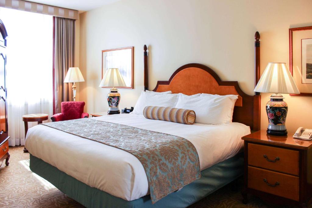 Postel nebo postele na pokoji v ubytování Hotel Providence