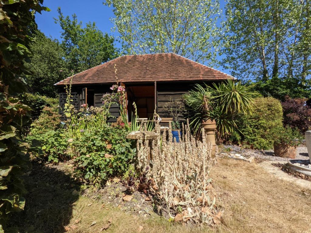 Zahrada ubytování Cabin in the Forest