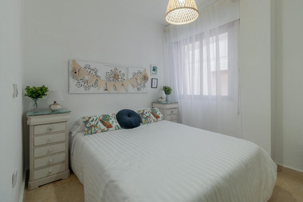 Posteľ alebo postele v izbe v ubytovaní Apartamento Céntrico Isaura