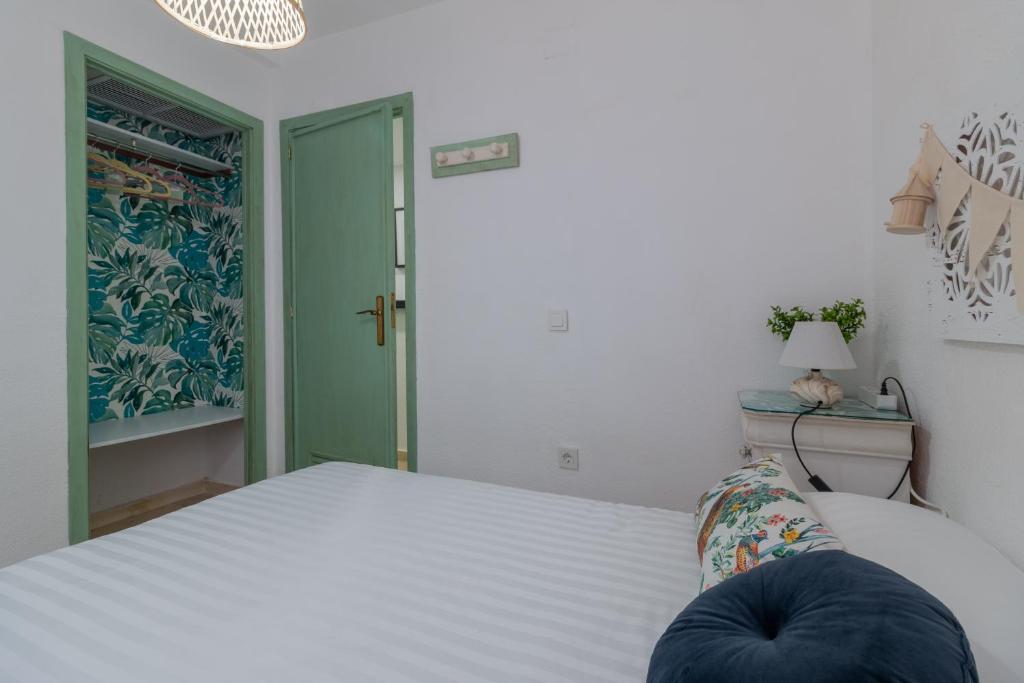 Posteľ alebo postele v izbe v ubytovaní Apartamento Céntrico Isaura