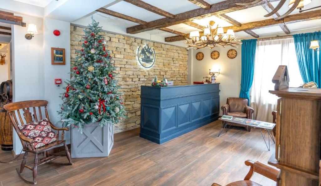 Posezení v ubytování Pine Chalets by KA Group