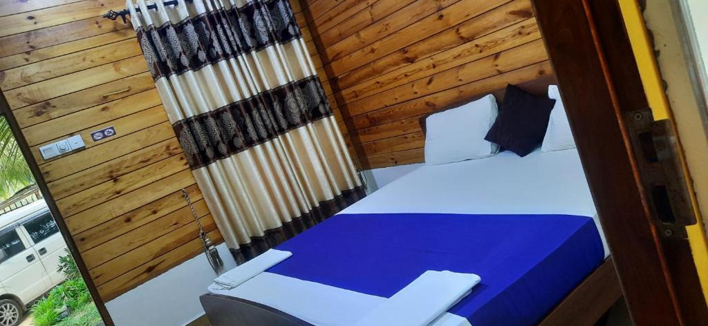 Postel nebo postele na pokoji v ubytování Elegant Green Beach Resort