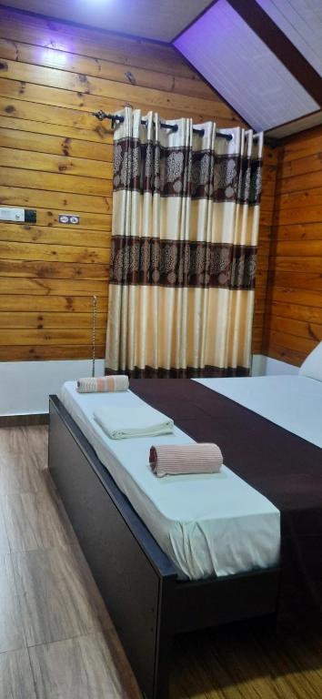 Postel nebo postele na pokoji v ubytování Elegant Green Beach Resort