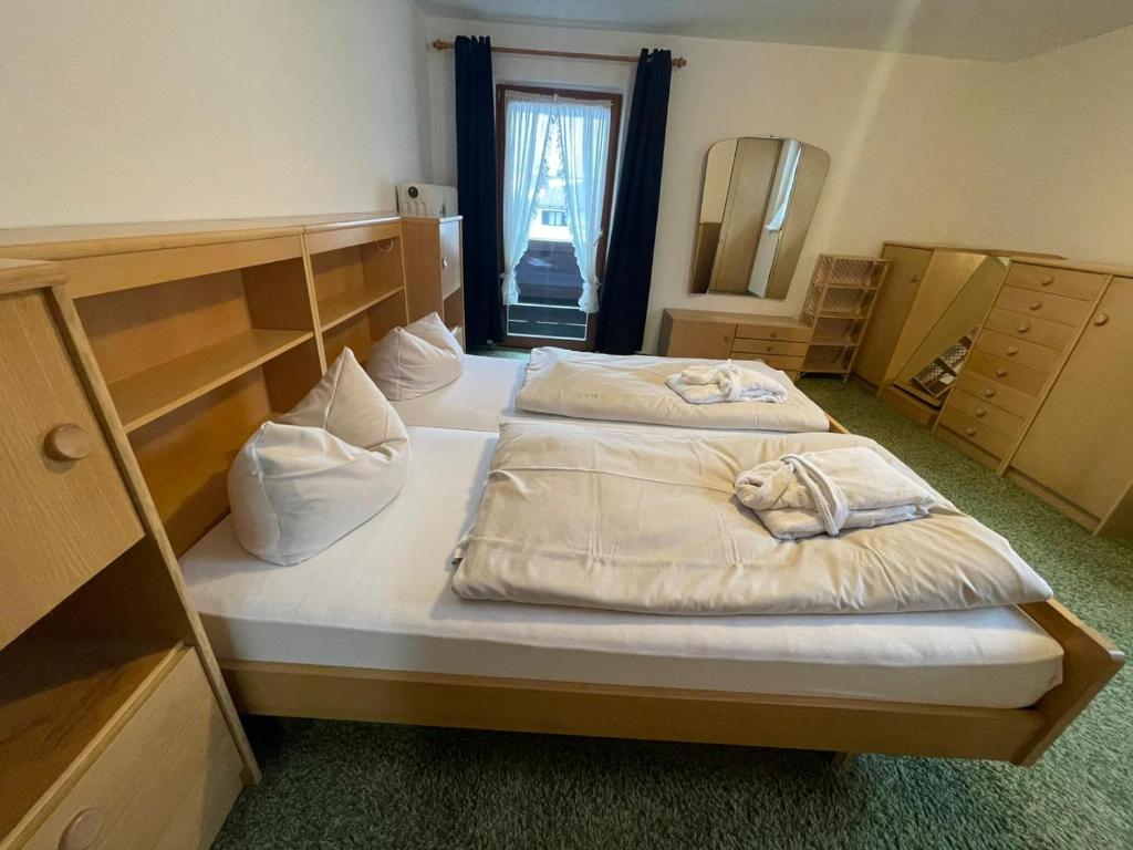 Voodi või voodid majutusasutuse Hotel Sonnleiten toas