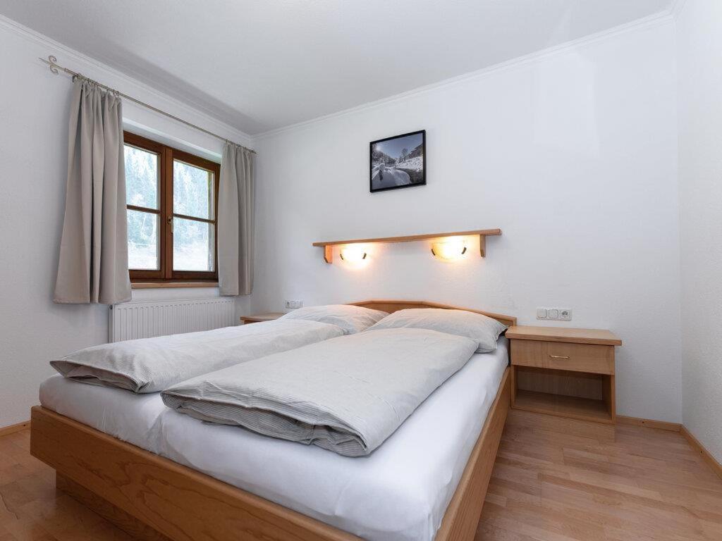 Postel nebo postele na pokoji v ubytování Bidner, Appartements