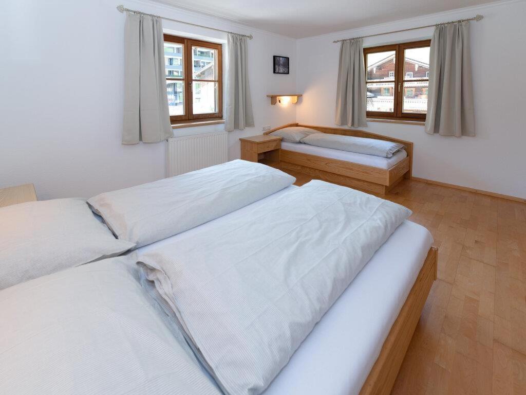 Postel nebo postele na pokoji v ubytování Bidner, Appartements
