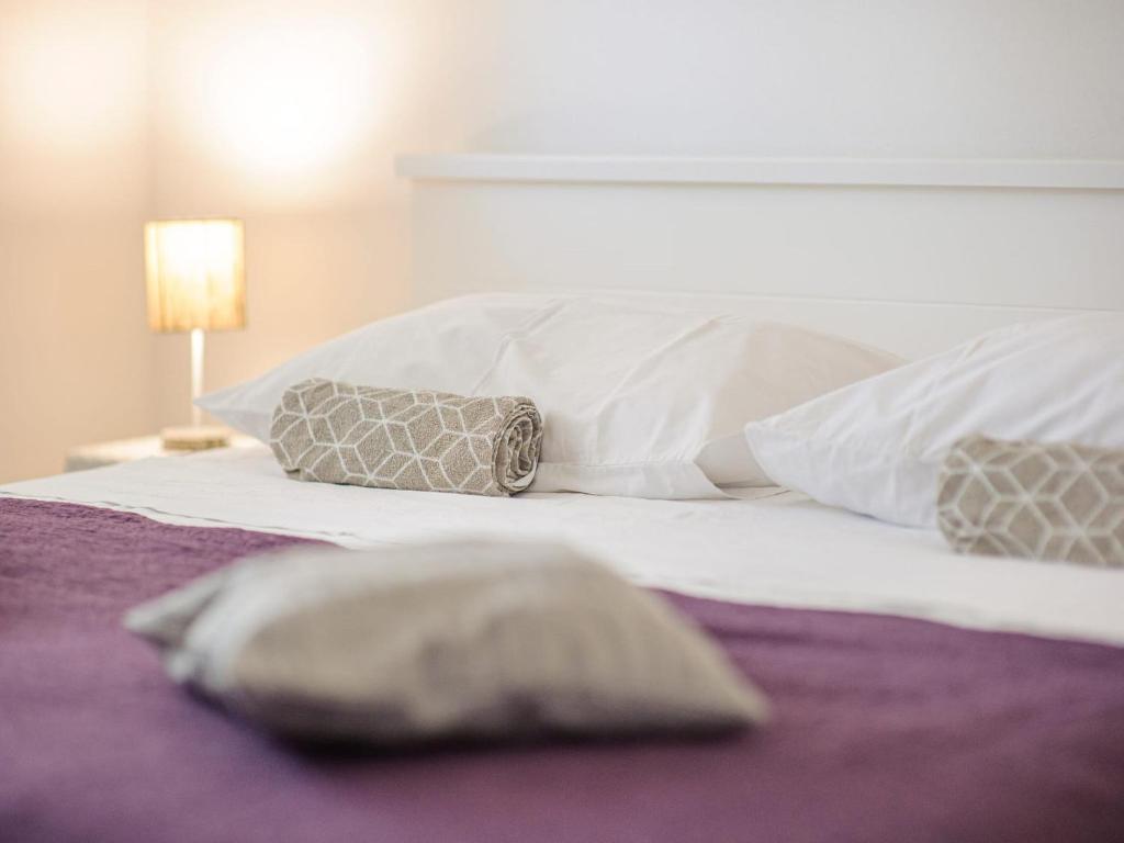 Posteľ alebo postele v izbe v ubytovaní Holiday Home Rokoko