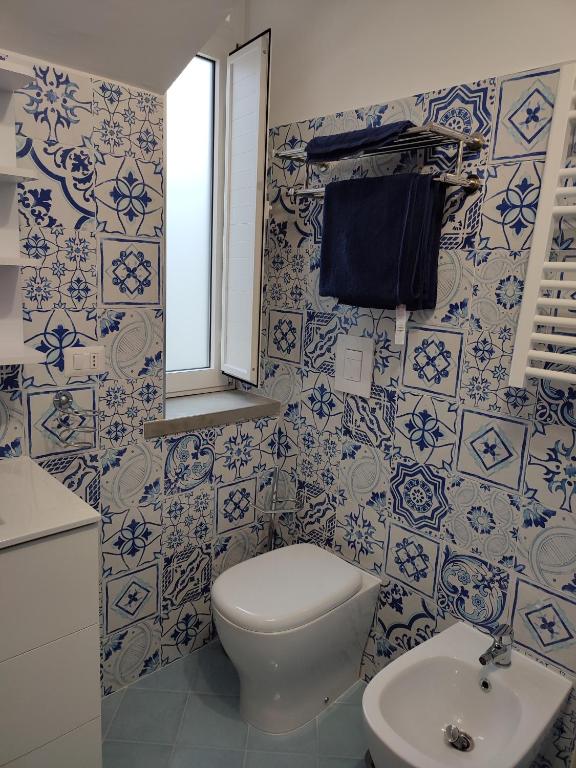 A bathroom at I Colori del Tramonto Apartment