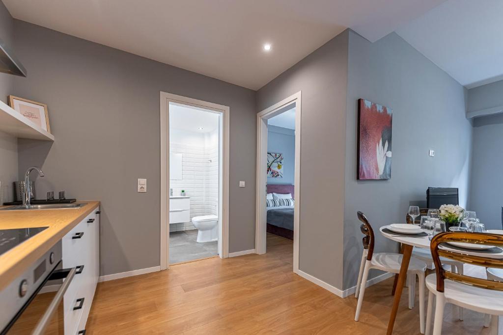 A kitchen or kitchenette at Athenian center apartments