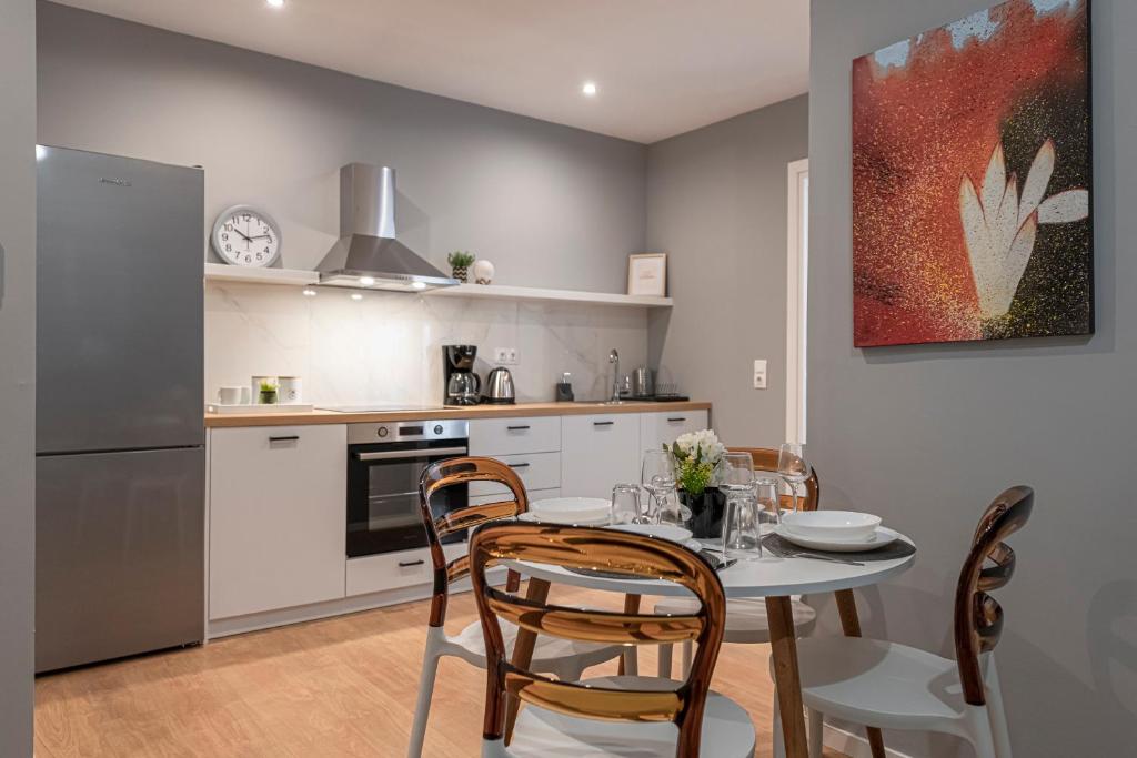 A kitchen or kitchenette at Athenian center apartments
