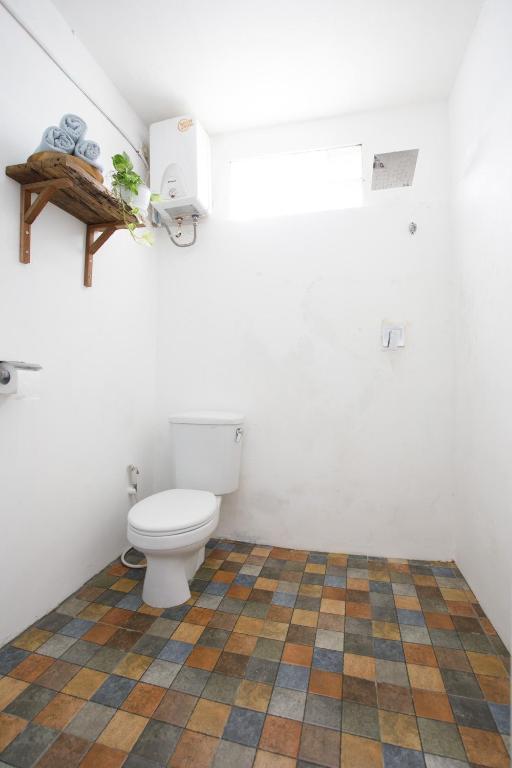 Koupelna v ubytování Rumah Kalpataru