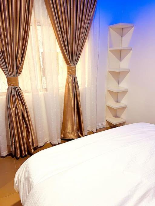 Postel nebo postele na pokoji v ubytování 1-bedroom apartment at Asokoro by ECOWAS