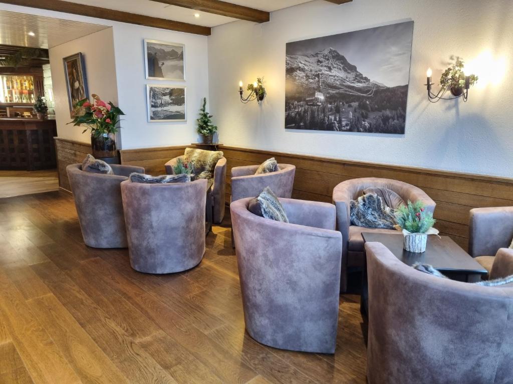 Uma área de estar em Hotel Bernerhof Grindelwald