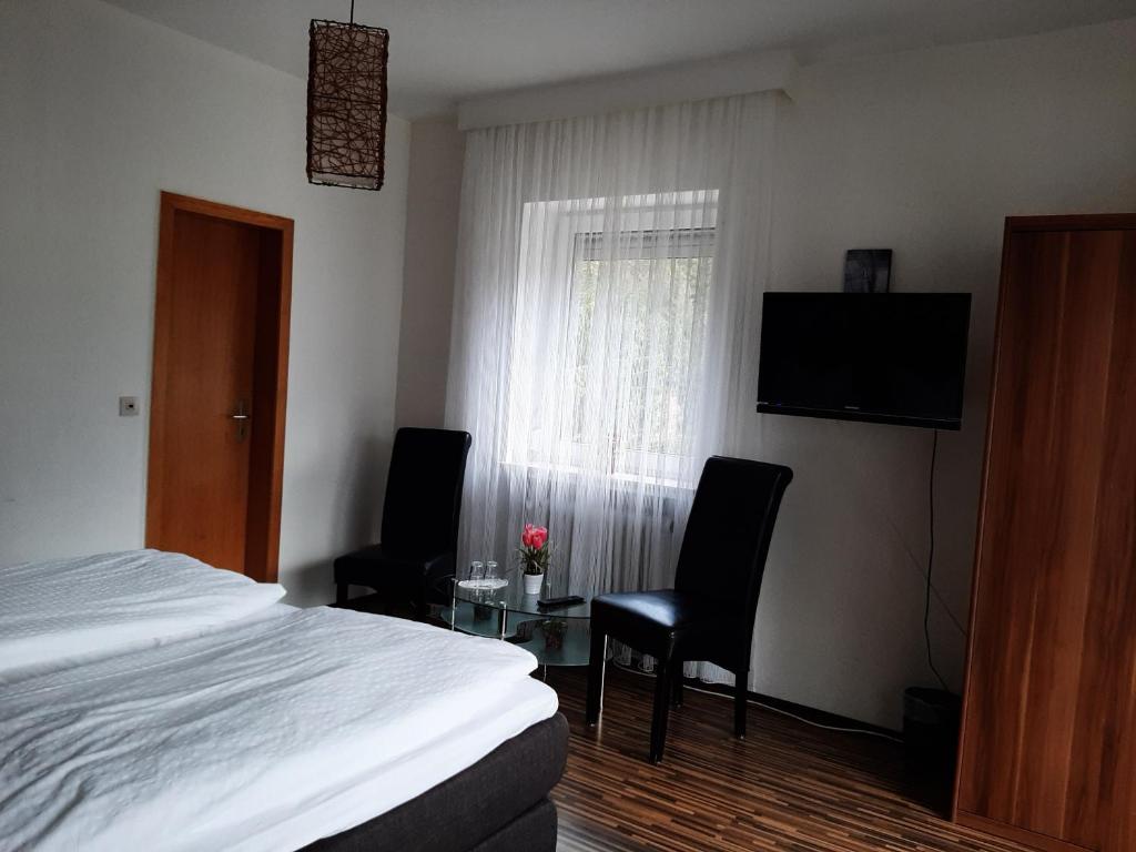 Postel nebo postele na pokoji v ubytování Berghotel-Willingen