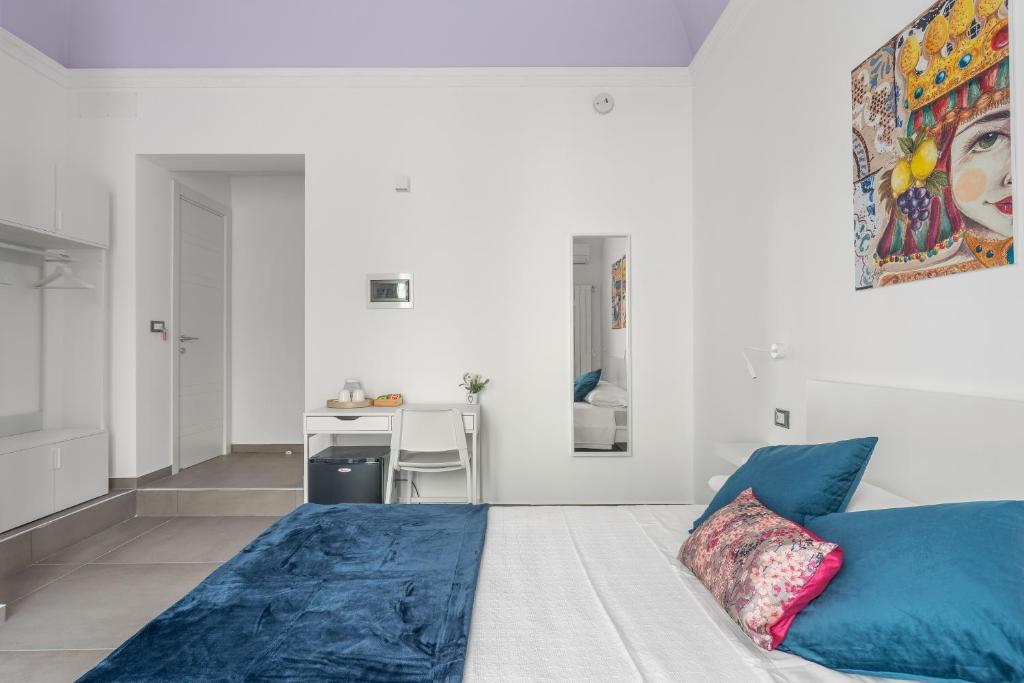 Postel nebo postele na pokoji v ubytování MolteVolte Rooms