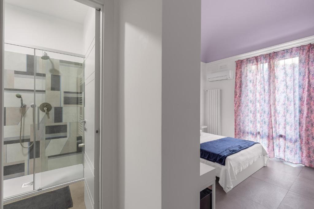 Postel nebo postele na pokoji v ubytování MolteVolte Rooms