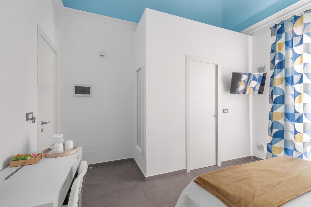 Postel nebo postele na pokoji v ubytování MolteVolte Rooms