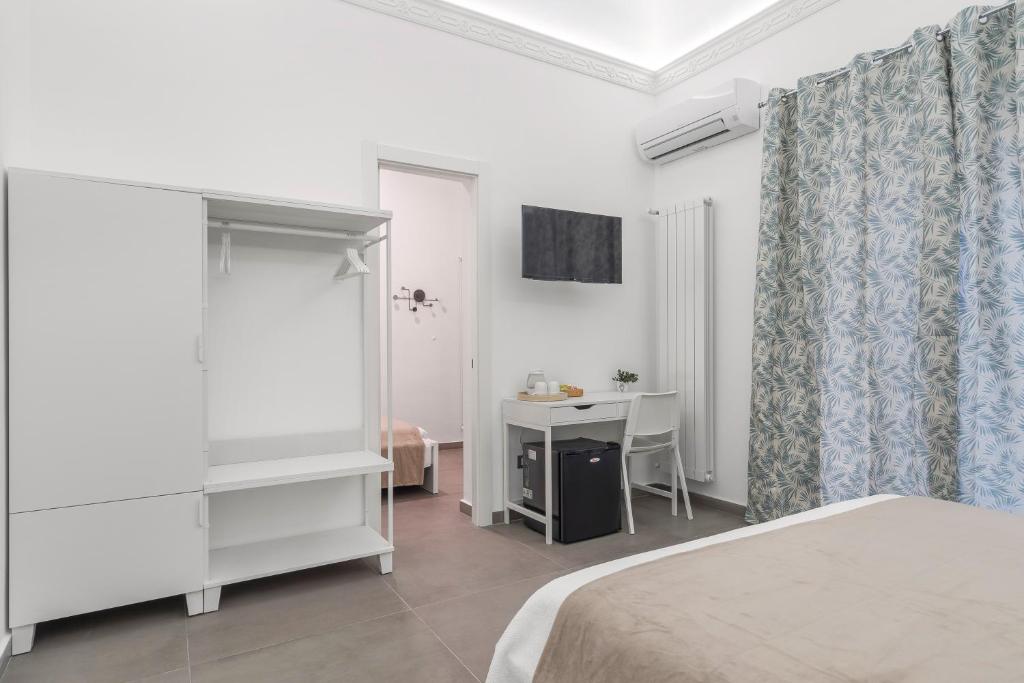 Postel nebo postele na pokoji v ubytování MolteVolte Rooms