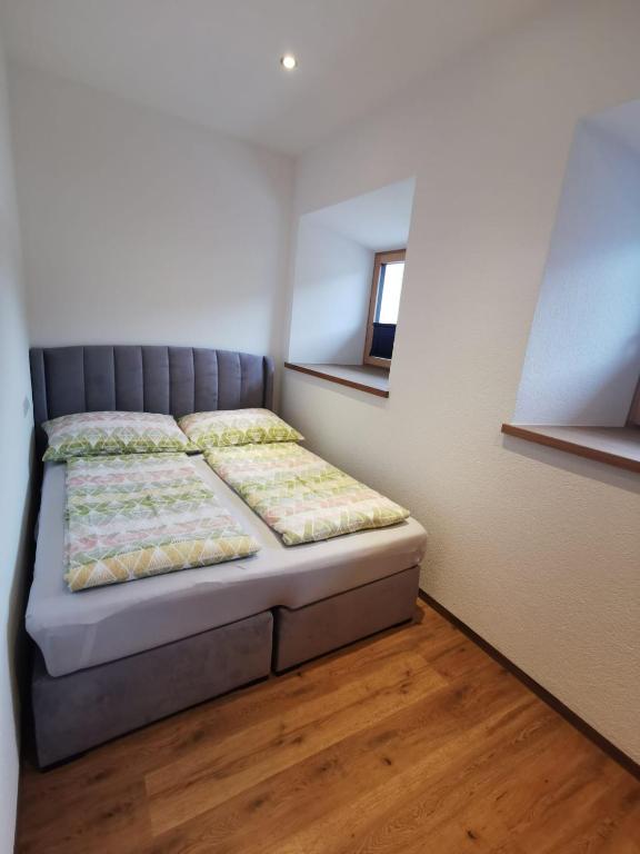 Postel nebo postele na pokoji v ubytování Apart Schlatter