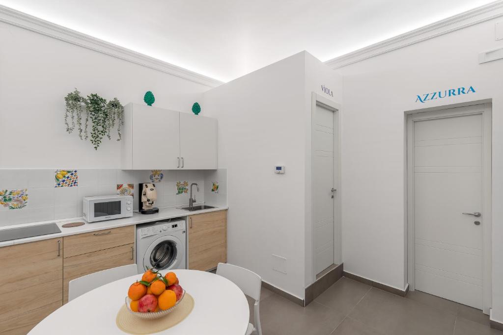 Kuchyň nebo kuchyňský kout v ubytování MolteVolte Rooms