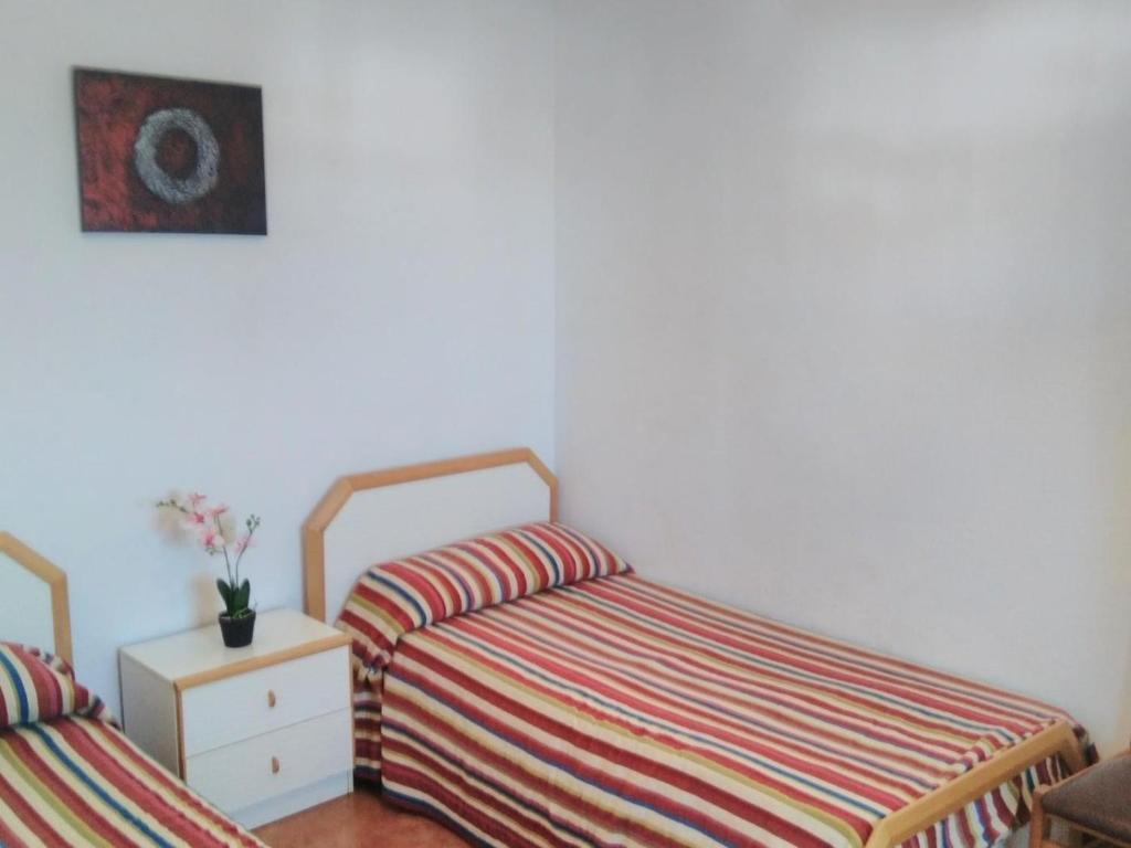 Postel nebo postele na pokoji v ubytování Bertur Peñíscola Azahar