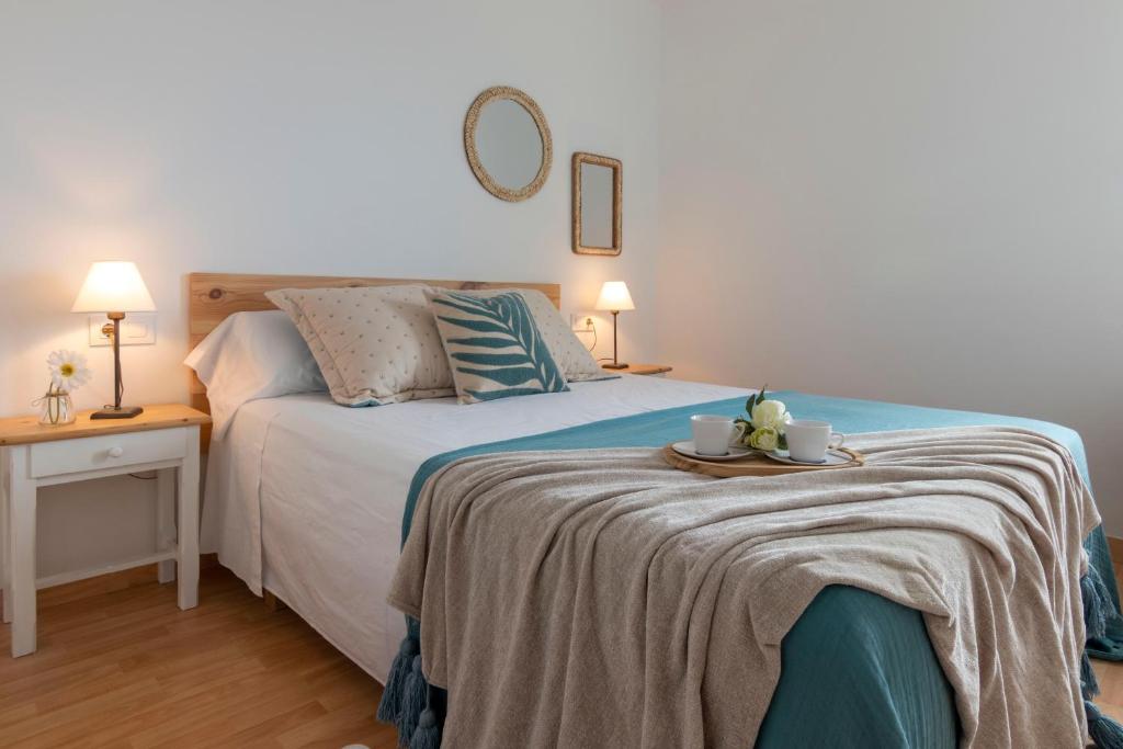 Postel nebo postele na pokoji v ubytování Apartamento Ponent 6