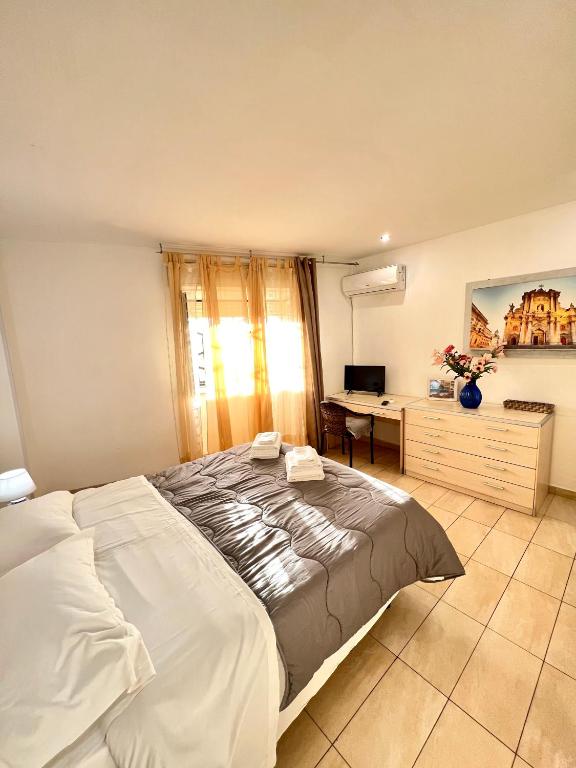Postel nebo postele na pokoji v ubytování Hotel Como