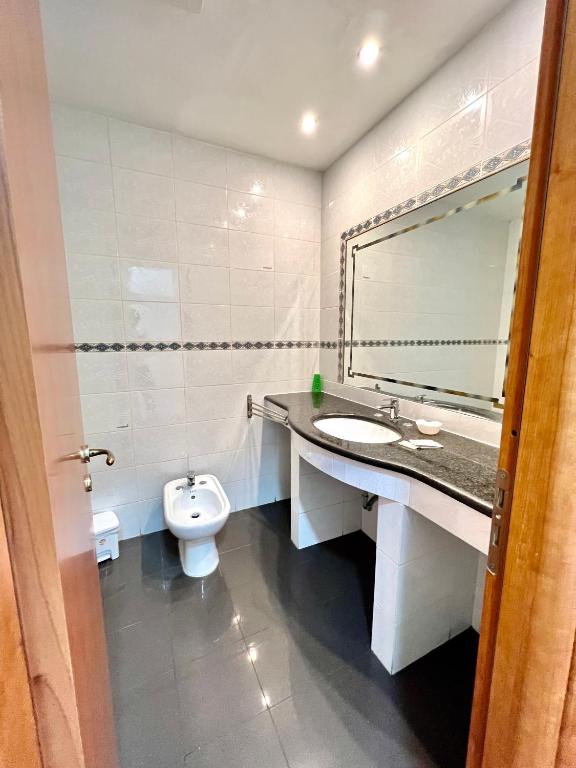 Koupelna v ubytování Hotel Como