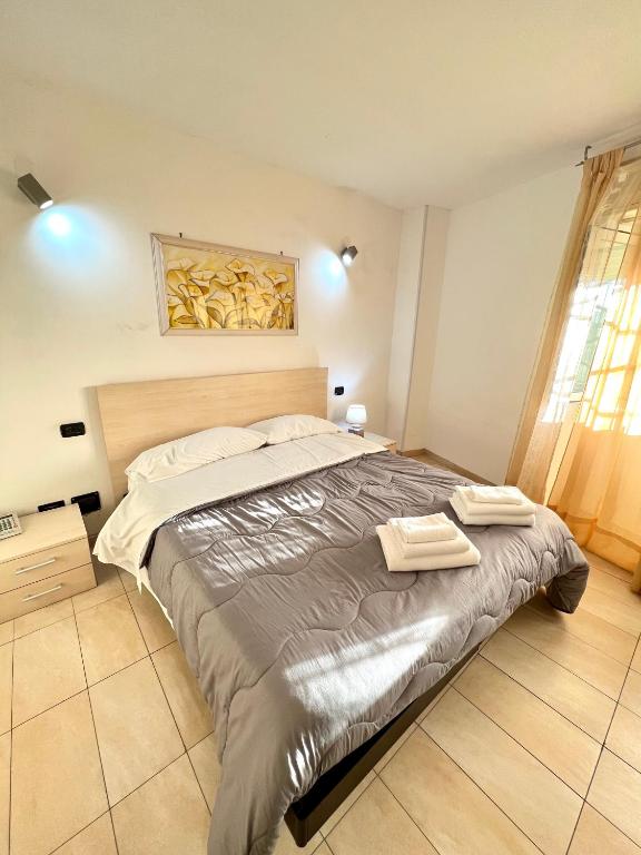 Postel nebo postele na pokoji v ubytování Hotel Como