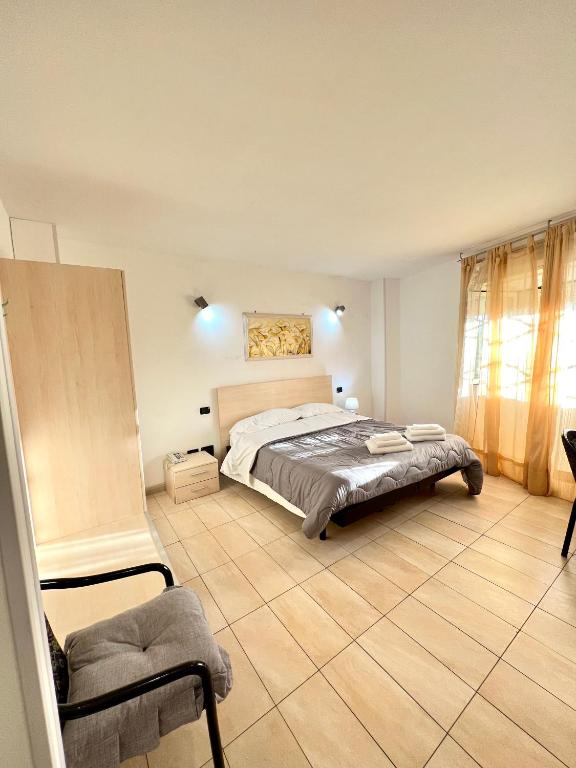 Postel nebo postele na pokoji v ubytování Hotel Como
