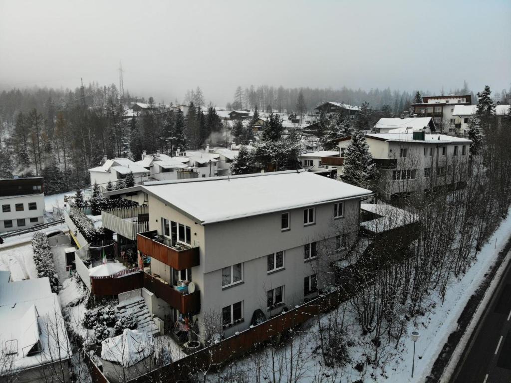 an aerial view of a city with snow covered buildings at Apartment Isolde by Interhome in Reith bei Seefeld