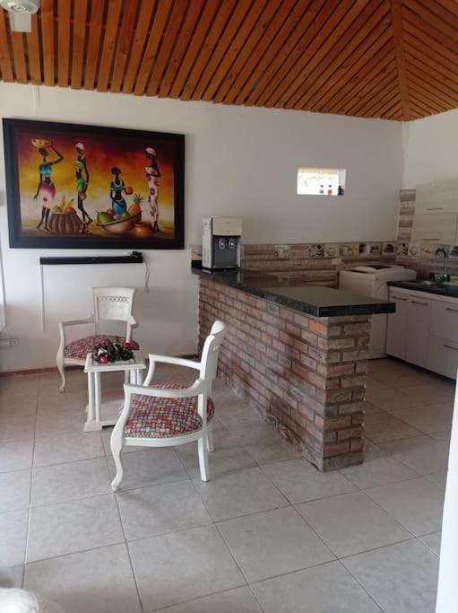 Kuchyň nebo kuchyňský kout v ubytování Casa de descanso acacias meta