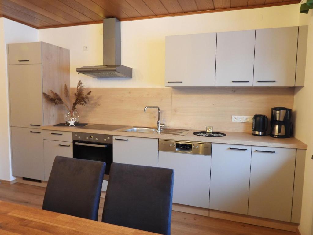 Kuchyň nebo kuchyňský kout v ubytování Holiday Home Haus Sigfried by Interhome