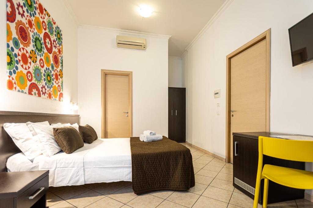 Łóżko lub łóżka w pokoju w obiekcie San Lorenzo Rooms