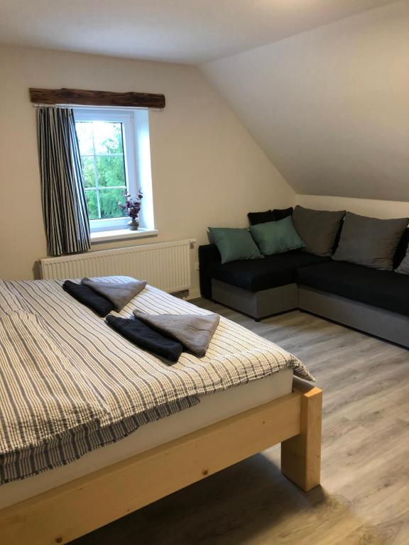 Postel nebo postele na pokoji v ubytování Apartmány Razová - Slezská Harta