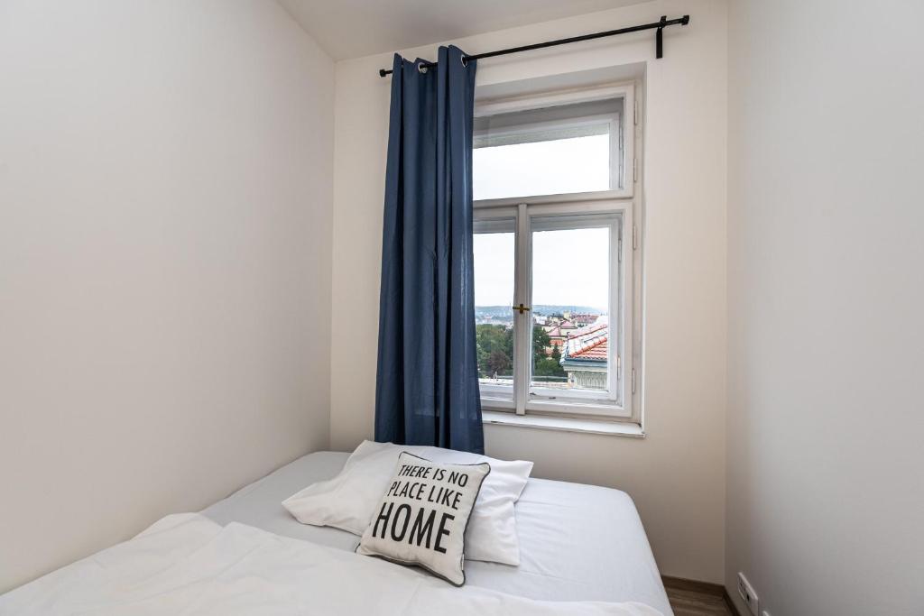 Postel nebo postele na pokoji v ubytování Apartment Americká 8