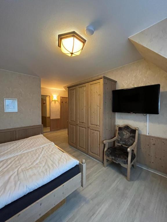 Postel nebo postele na pokoji v ubytování Hotel Clemens