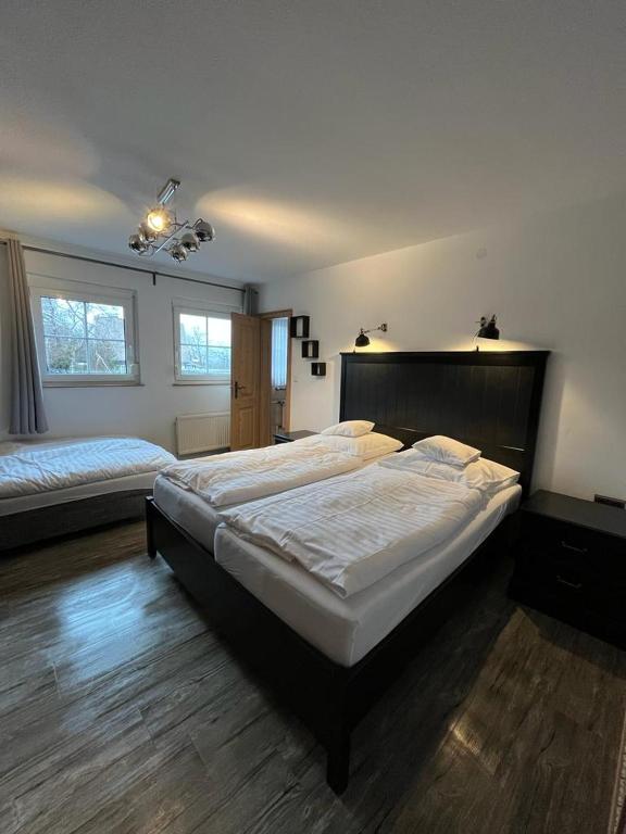 Postel nebo postele na pokoji v ubytování Hotel Clemens
