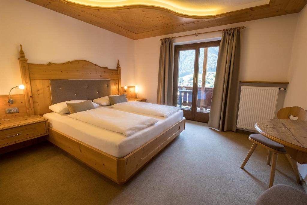 Postel nebo postele na pokoji v ubytování Garni Alba Bed & Breakfast