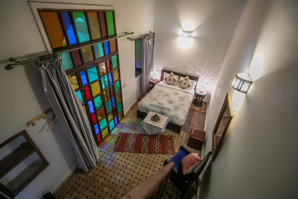 Postel nebo postele na pokoji v ubytování Riad Dar Hidaya Fes