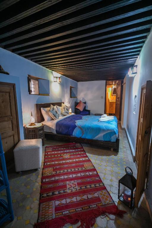 Postel nebo postele na pokoji v ubytování Riad Dar Hidaya Fes