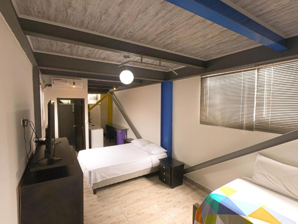 Krevet ili kreveti u jedinici u okviru objekta Apartamento 3 Cali Sur
