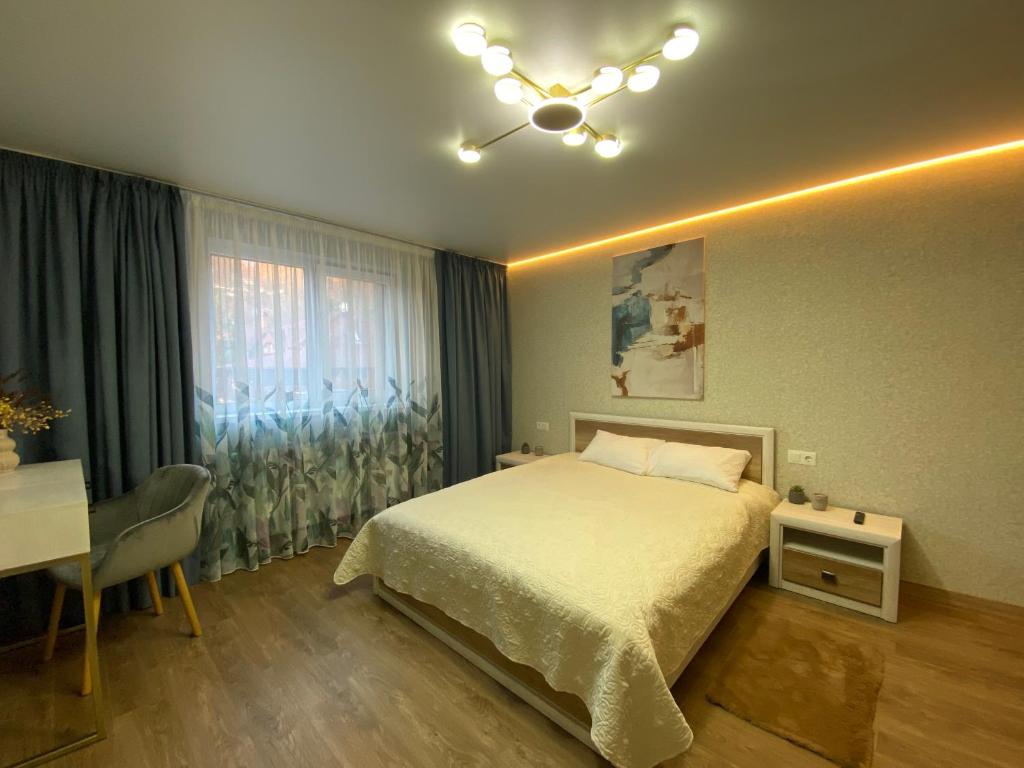 Postel nebo postele na pokoji v ubytování Zelena Sadyba