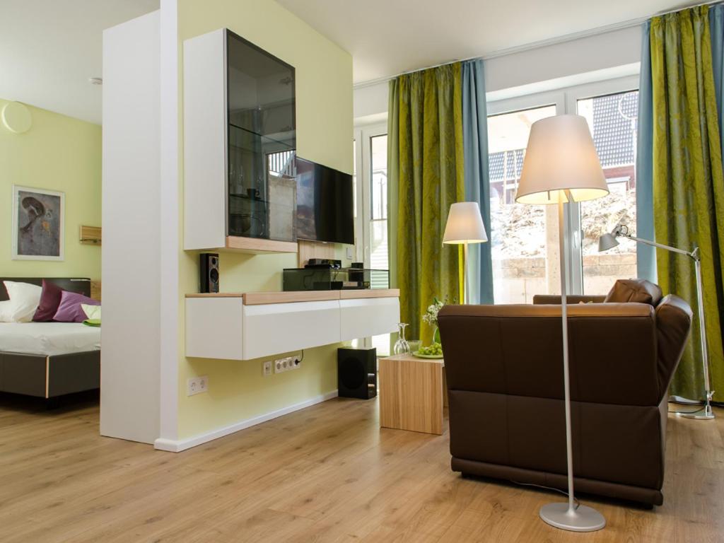 TV a/nebo společenská místnost v ubytování de Luxe Suite Sonnenaue