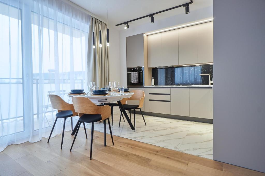 Kuchyň nebo kuchyňský kout v ubytování The Gatsby Apartment