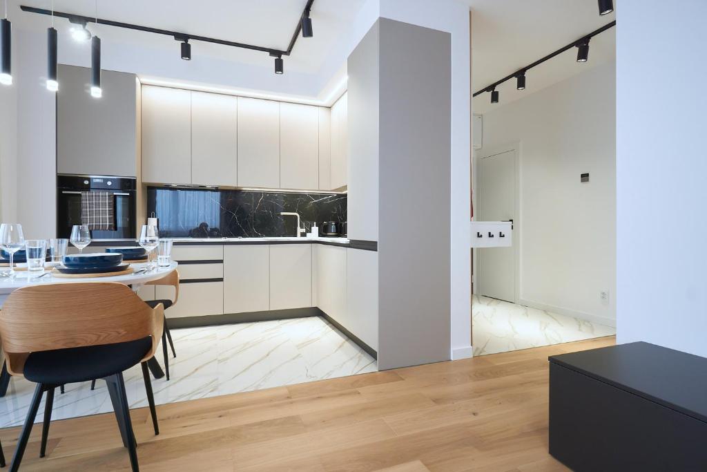 Kuchyň nebo kuchyňský kout v ubytování The Gatsby Apartment