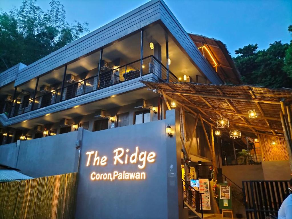 a building with a sign that reads the ridge gordon palayan at The Ridge Coron in Coron