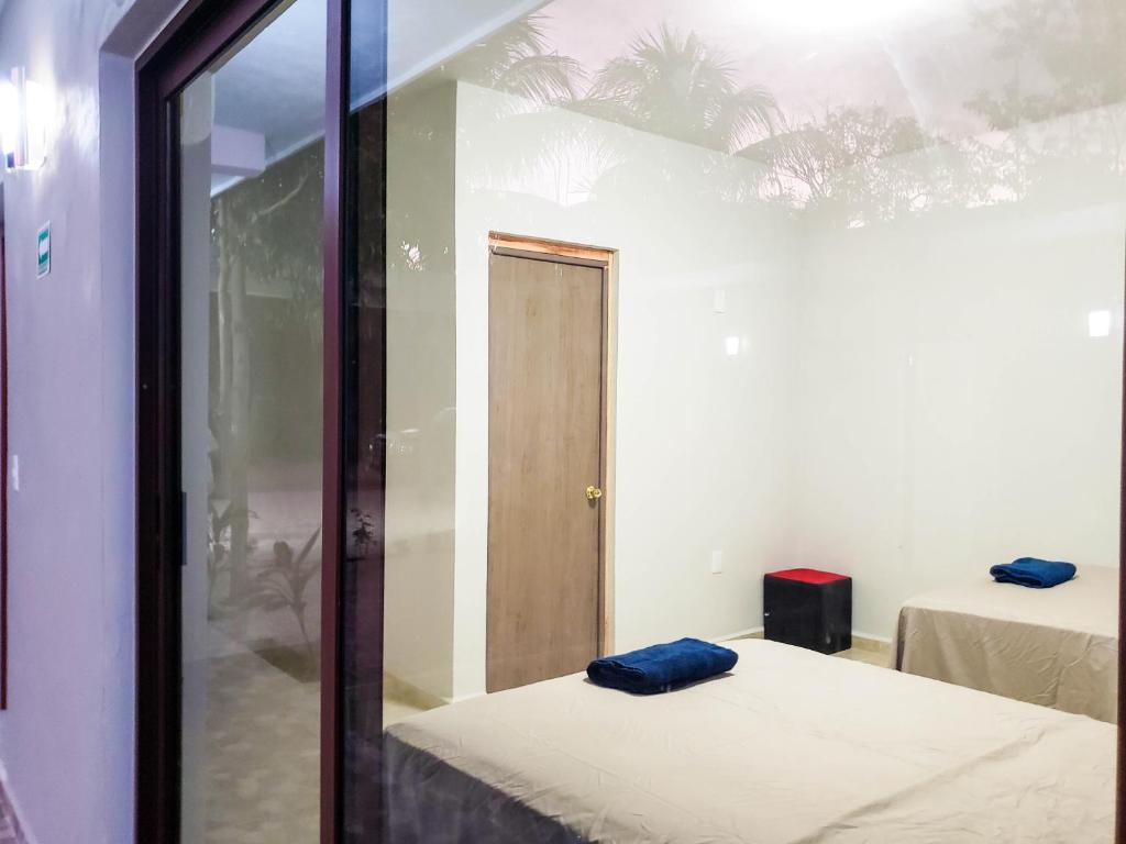 Postel nebo postele na pokoji v ubytování Hotel Blue Turtle
