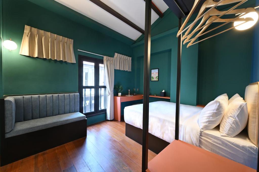 Ένα ή περισσότερα κρεβάτια σε δωμάτιο στο Dream Chaser Boutique Capsule Hotel