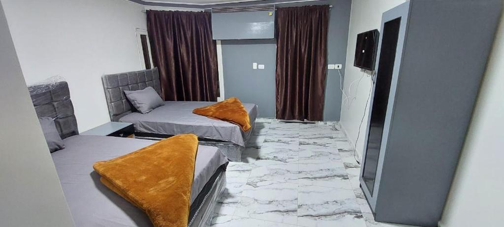Postel nebo postele na pokoji v ubytování Best Dreams Hotel